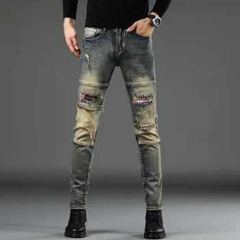 סגנון חדש של גברים אופנתיים קרע תוקנו ג ' ינס עם אישיות תפרים אירופאי ואמריקאי רגל סלים רטרו גמישות המכנסיים